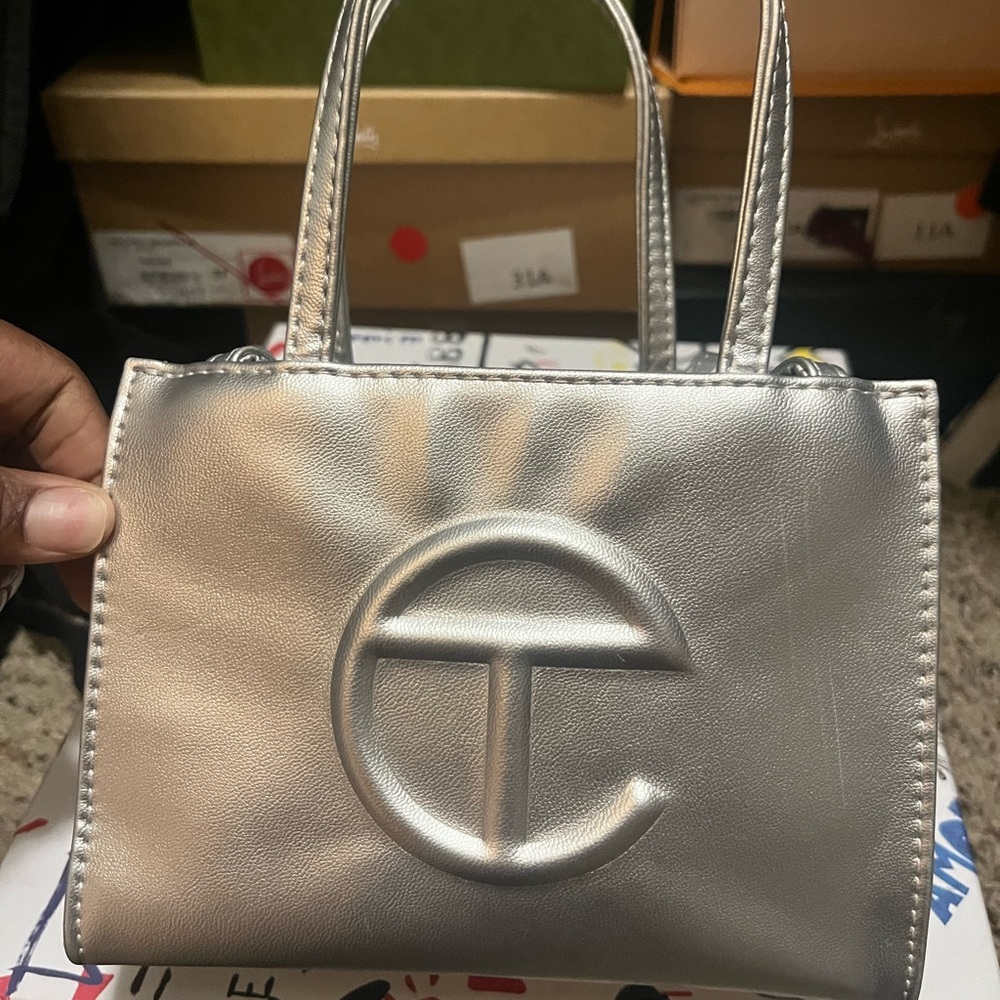Silver Telfar mini bag.